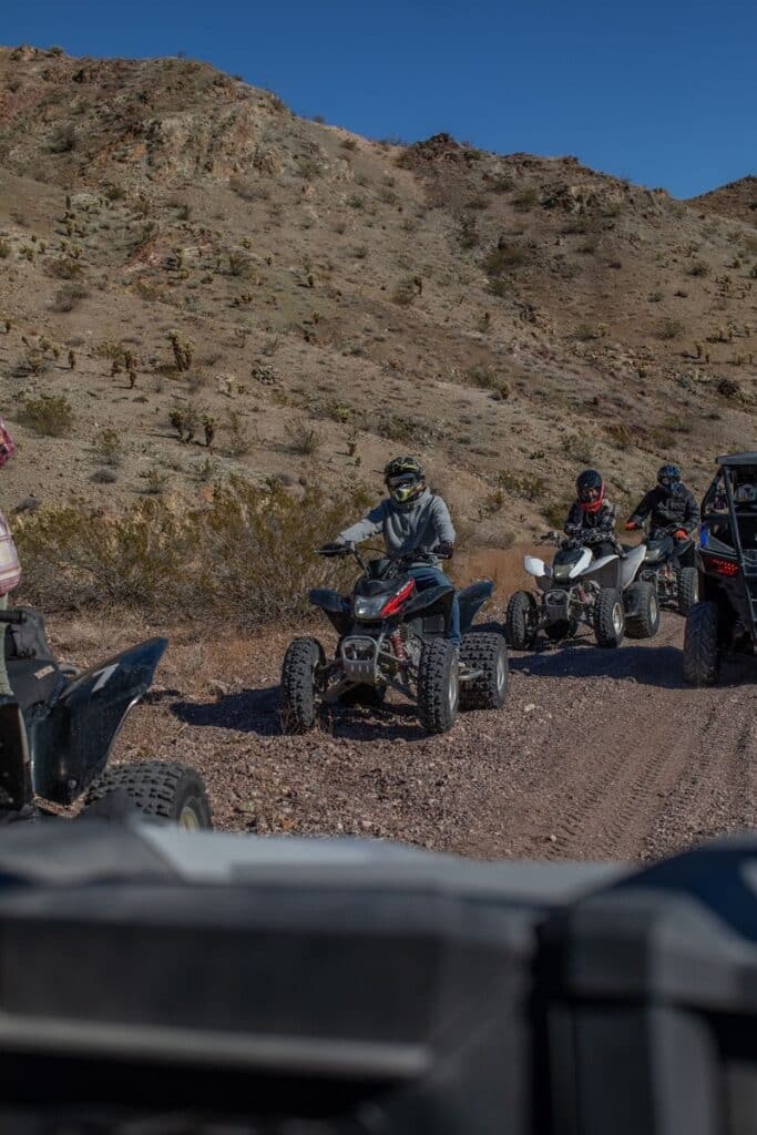 Three ATV riders in Nevada on an Awesome Adventures tour.