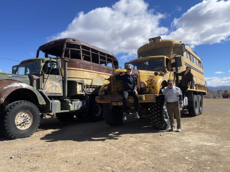 Explore vintage trucks under a blue Nevada sky. Perfect for Las Vegas outdoor adventures like ATV tours or Ghost Town sightseeing!.