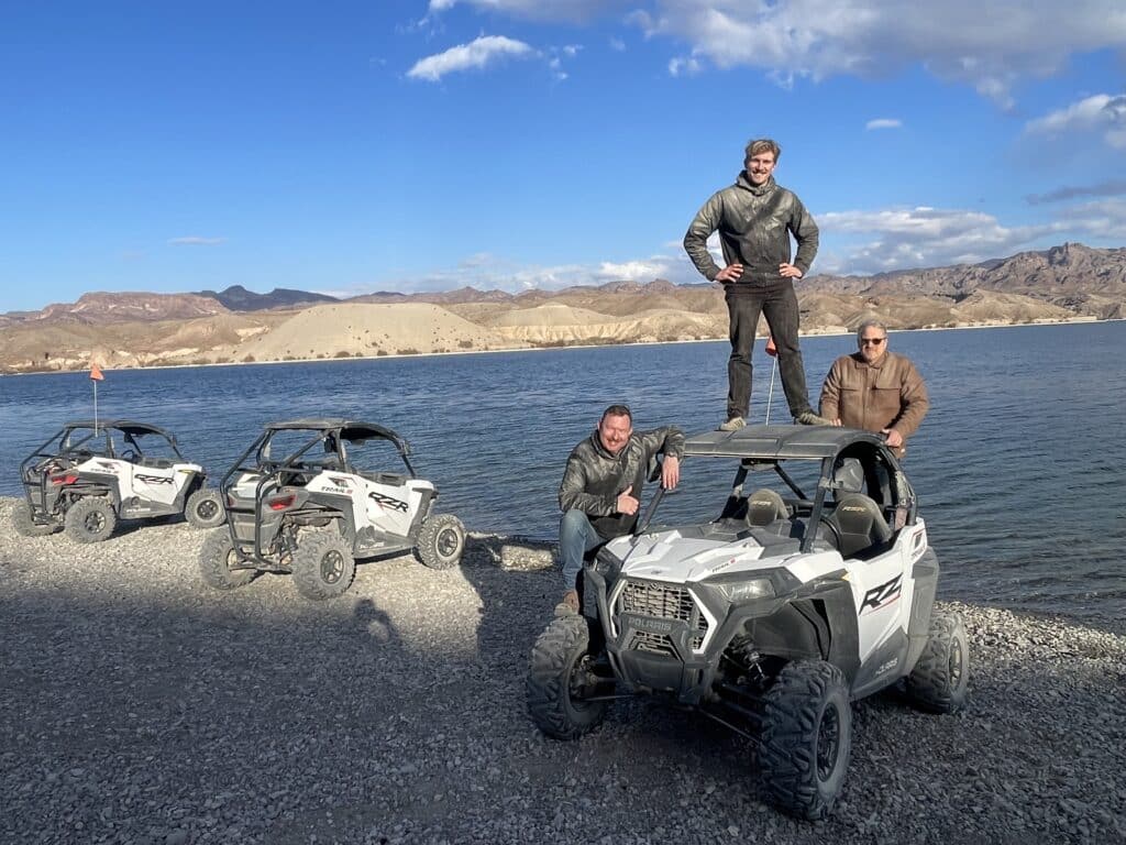 Explore the spirit of Outdoor Adventures Nevada near Las Vegas with ATV tours by a shimmering lake, mountains, and Colorado River views.