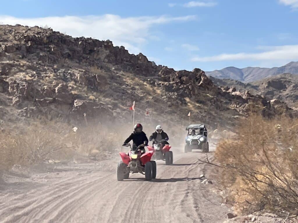 Experience a thrilling ATV tour near Las Vegas! Ride red ATVs through Nevadas rugged terrain, with RZR off-road action by the Colorado River.
