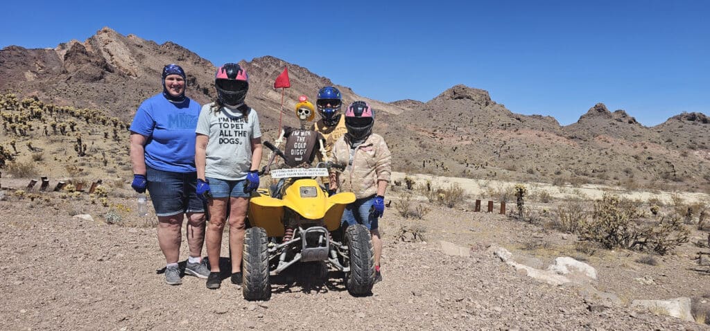 Explore Nevadas rugged desert near Las Vegas with an exciting ATV tour. Group enjoys the landscape and views of the Colorado River.