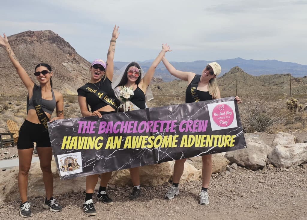 Four women enjoy a Las Vegas bachelorette adventure: ATV tours, RZR rides & Colorado River fun in scenic Nevada desert.