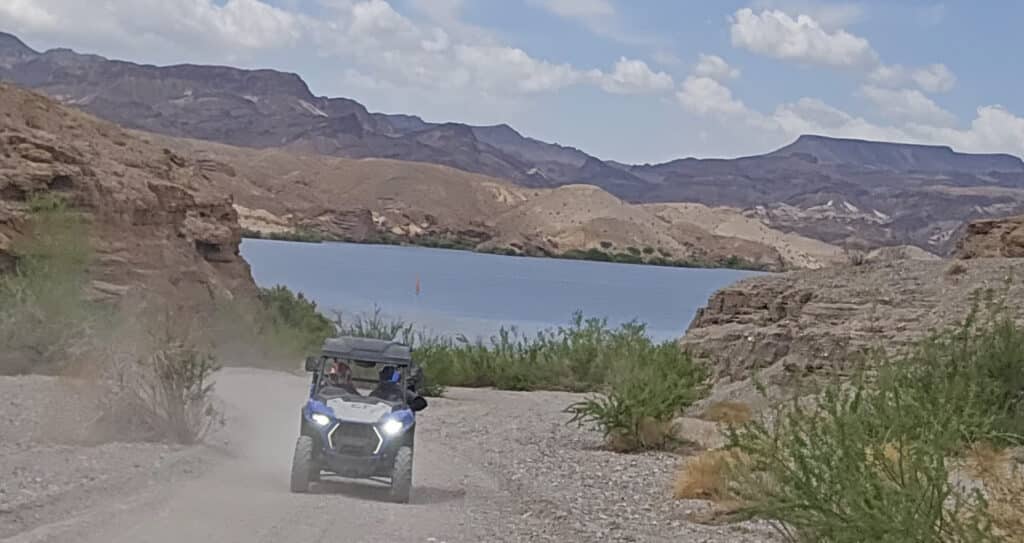 Experience an epic RZR off-road ride near Las Vegas on dusty Nevada trails with Colorado River views and Ghost Town sightseeing.