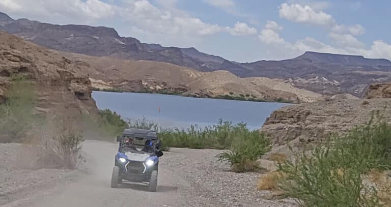 Experience an epic RZR off-road ride near Las Vegas on dusty Nevada trails with Colorado River views and Ghost Town sightseeing.