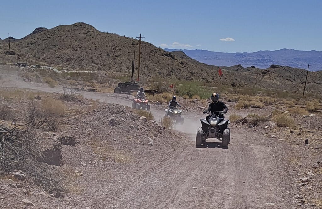 Experience thrilling ATV tours near Las Vegas as riders explore Nevadas rocky desert trails with views of the Colorado River.