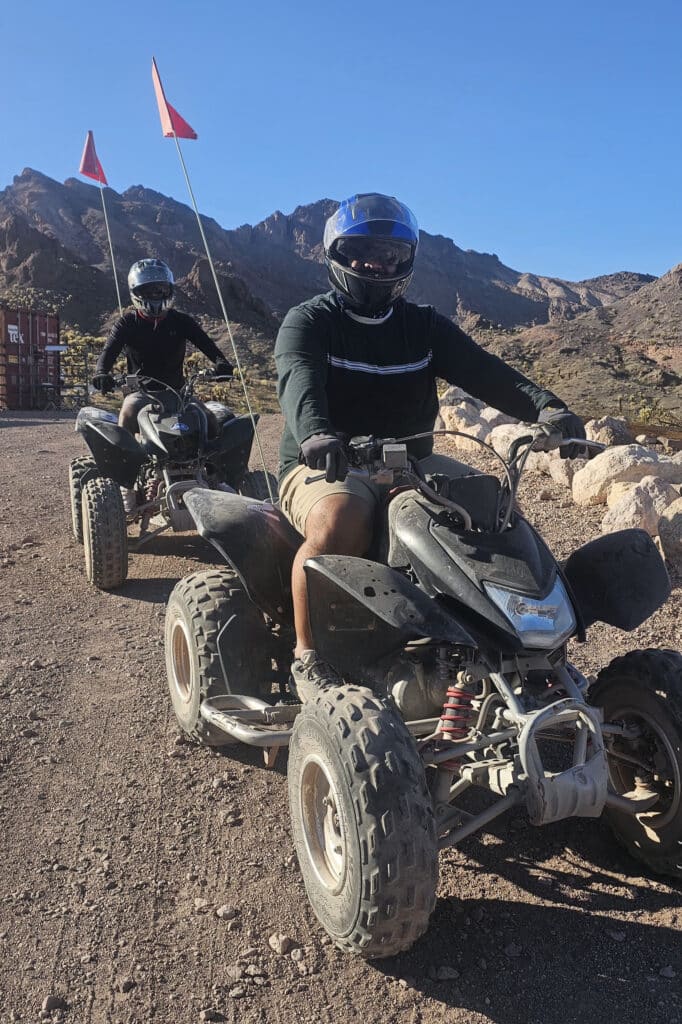 Explore Nevada’s rugged trails near Las Vegas on an ATV tour—ride black quad bikes under clear skies by the Colorado River.