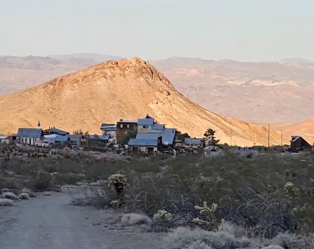 Journey down a dusty Nevada desert road near Las Vegas to a rustic ghost town, perfect for ATV tours and RZR off-road adventures.