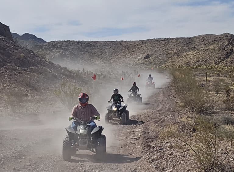 Experience an exciting ATV tour near Las Vegas, Nevada, riding along dusty desert trails by the Colorado River and scenic Ghost Towns.