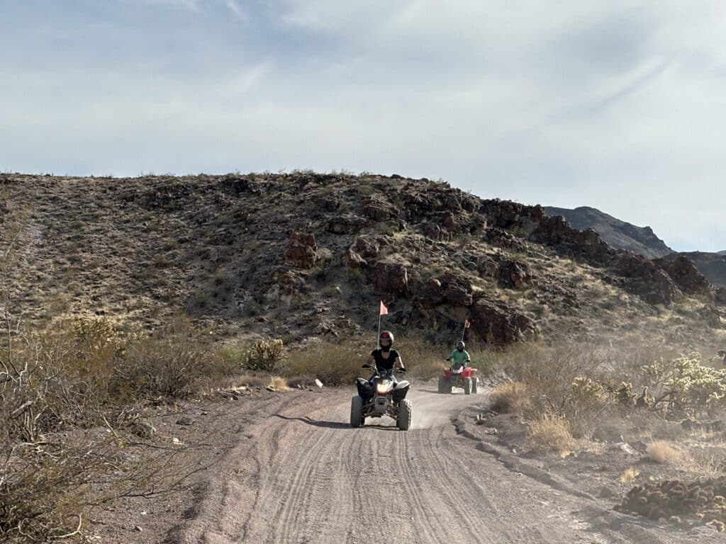 Experience thrilling ATV tours near Las Vegas, Nevada, riding dusty desert trails by rocky hills and the Colorado River.