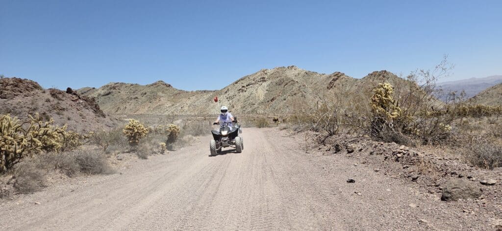 Experience thrilling ATV tours near Las Vegas on dusty Nevada trails, with desert views, cacti, and scenic Colorado River backdrops.
