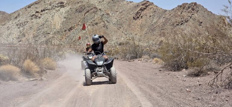 Experience an exciting ATV tour near Las Vegas, Nevada, riding dusty desert trails by rocky mountains and the Colorado River.