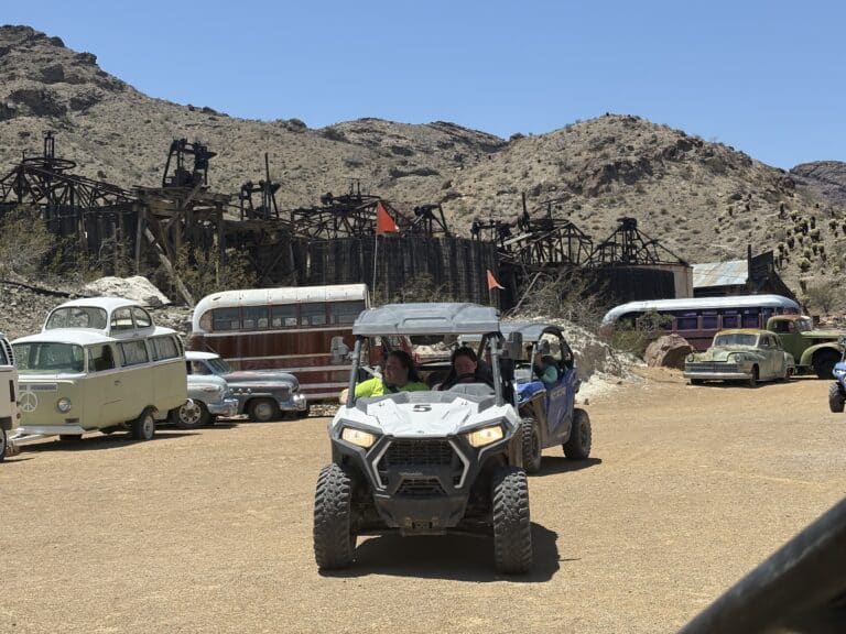 Experience an exciting RZR off-road ride near Las Vegas, Nevada—pass vintage cars and ghost town relics on scenic desert trails.