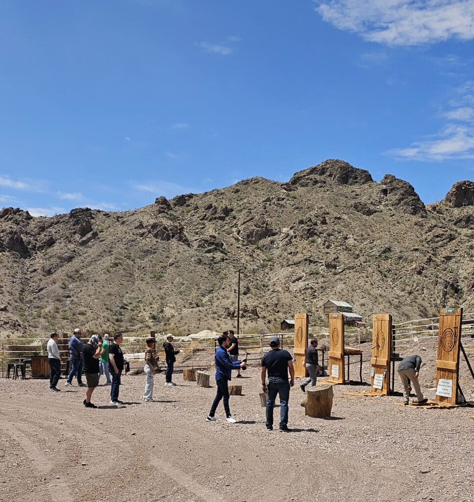 Experience axe throwing in the Nevada desert near Las Vegas, with stunning mountain views—perfect after an ATV or RZR tour!.