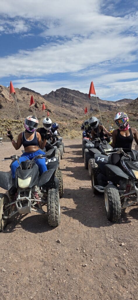 Adventure seekers enjoy an ATV tour near Las Vegas, riding past Nevada’s rocky desert mountains with views of the Colorado River.