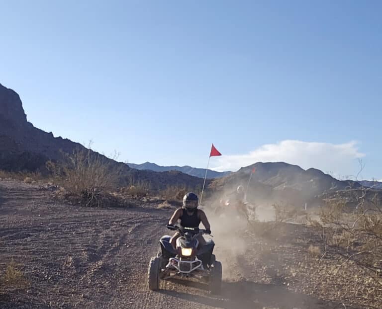 Experience thrilling ATV tours near Las Vegas, NV—ride desert trails with red-flagged ATVs and scenic mountain views!.