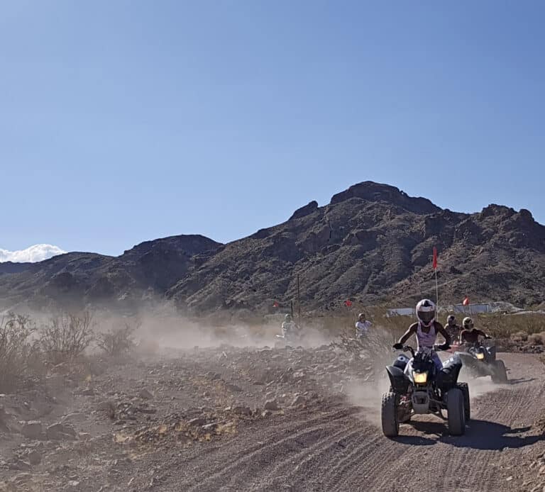 Experience thrilling Las Vegas ATV tours on desert trails near the Colorado River, with stunning Nevada mountains and ghost town views.