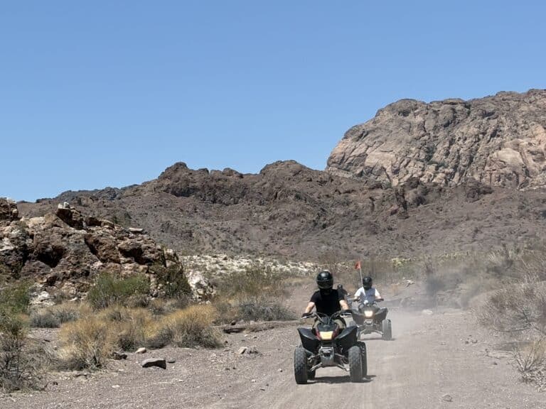 ATV tour near Las Vegas: Ride RZRs on dusty desert trails with mountain views, sparse Nevada scenery, and Colorado River sights.