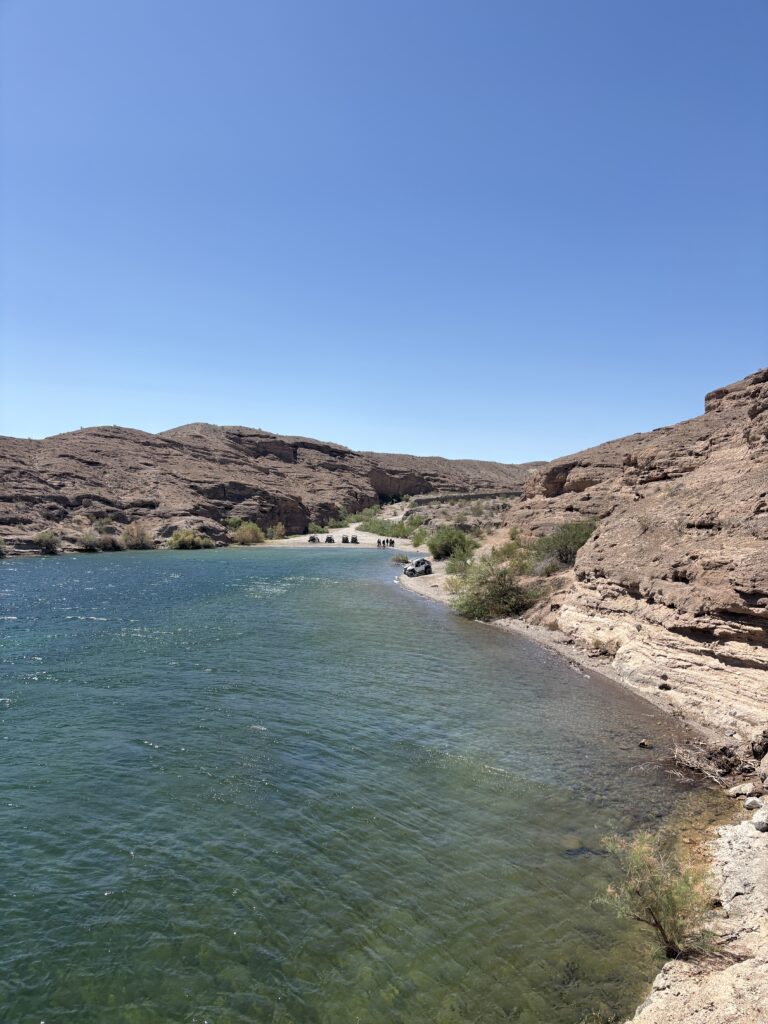 Colorado River near Las Vegas, Nevada: clear water, rocky desert hills, riverside ATV tours, RZR rides, and kayak adventures.