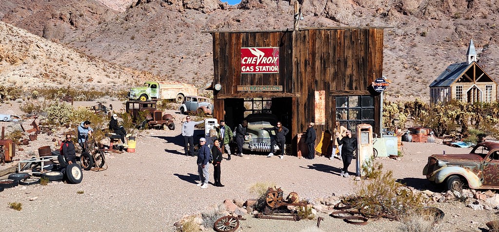 Explore Nelson Ghost Town near Las Vegas, Nevada—vintage cars, Chevron gas station & desert views perfect for sightseeing tours.